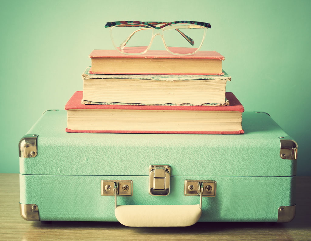 Books and suitcase